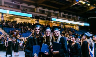 group of graduates smiling