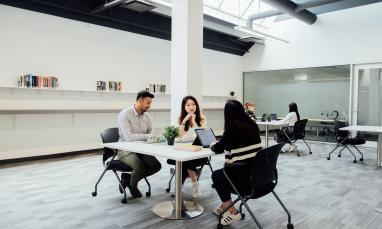 international students seated at table