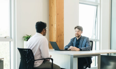people sitting at table in Kuhn Centre