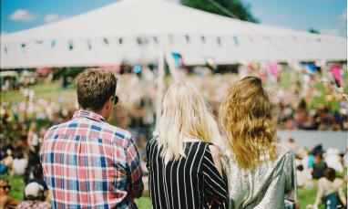 people looking at a tent