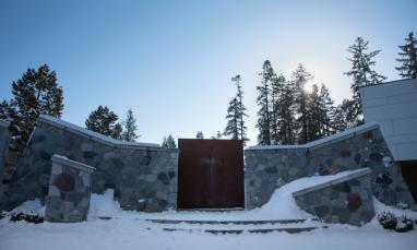 Outdoor chapel covered in snow.