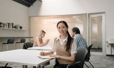 Student looking at camera and smiling