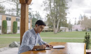 A student studying outside