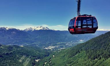 A gondola against the background of mountains.