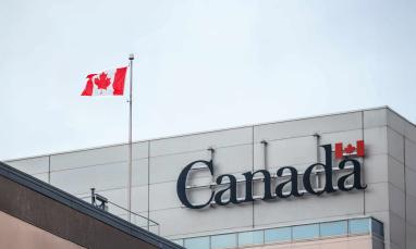 Stock photo of Canada logo and flag.