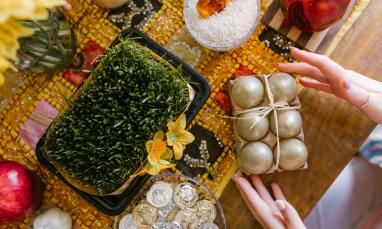 Person Holding A Tray Of Dyed Eggs