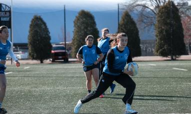 TWU girl students playing Rugby in the field