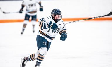 TWU student playing hockey 