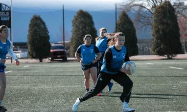 TWU girl students playing Rugby in the field