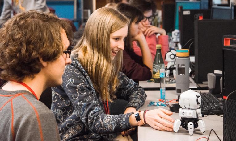 girl programming robot