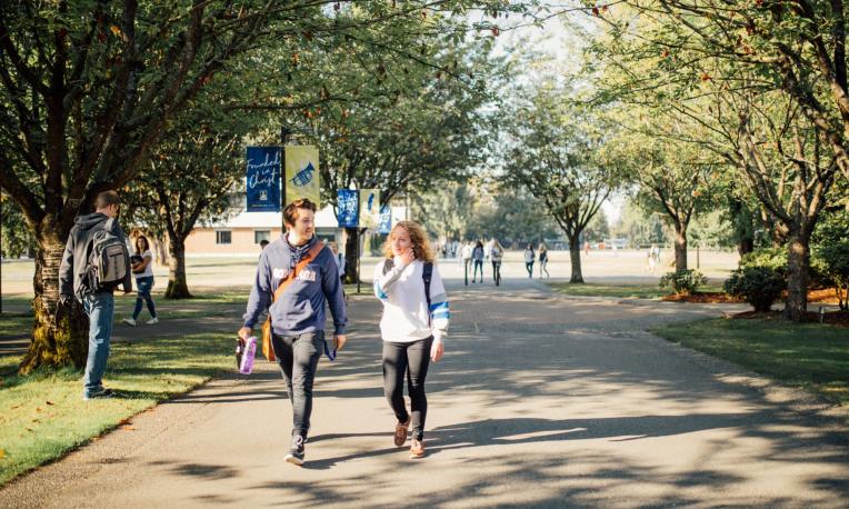 students walking to class on campus