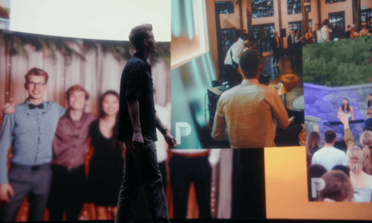 spencer funk standing in front of screen