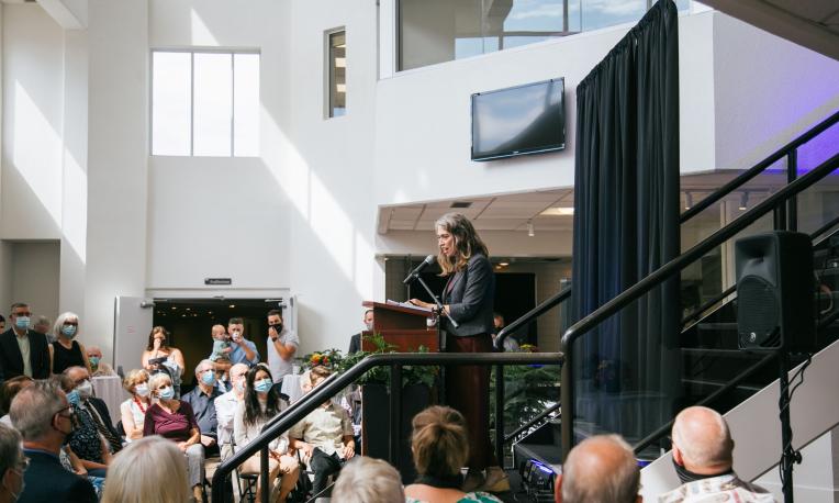 Dr. Allyson Jule speaking at the DeVries Centre.