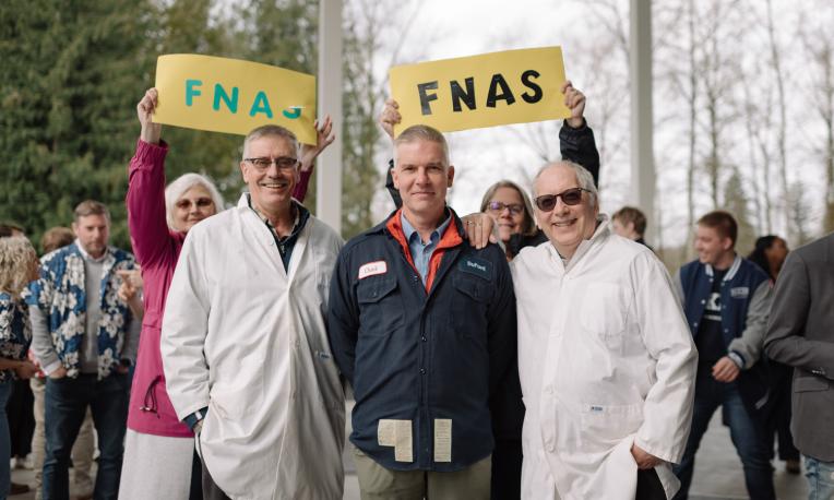 Bob Wood, Chad Friesen and David Clements taking a photo at Giving Day 2025
