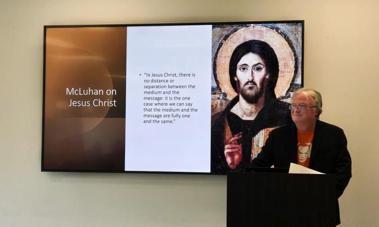 Dr. Grant Havers presenting his book