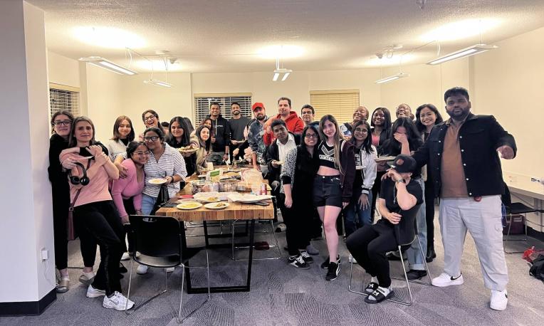 Niloufar and grad students at a spontaneous group dinner