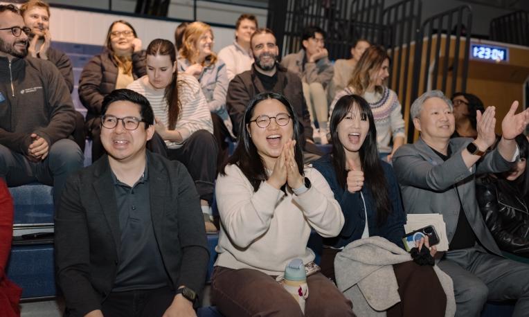 Staff cheering in the gym