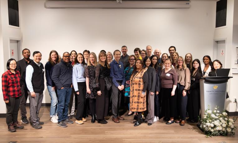 Group of people in DeVries Auditorium