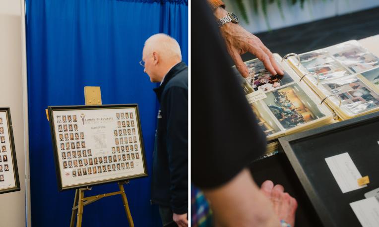 TWU Homecoming alumni looking at old photos and college materials.