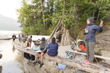 People sitting on shore