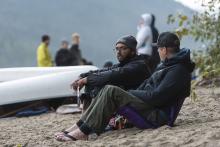 people talking on shore