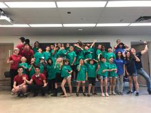 group photo of large group of smiling kids 