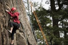 woman rock climbing