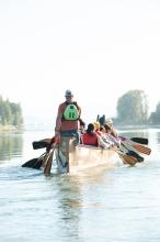 people paddling