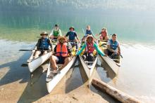 people paddling
