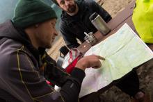man looking at a map