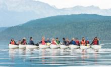 people paddling