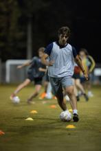 Man playing soccer.