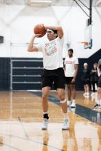 Man playing basketball.