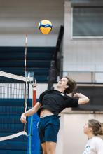 Man playing volleyball.