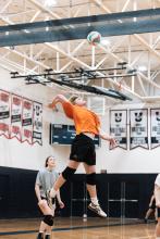 Man playing volleyball.