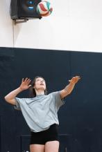 Girl playing volleyball.