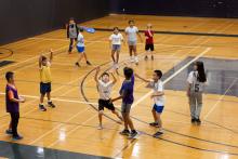 A group of kids playing dodgebal