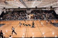 Homecoming 2024 Battle of the Spartans volleyball game in gym