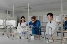 Students doing experiment in Chemistry lab