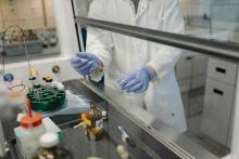 A student working on an experiment in Chemistry lab