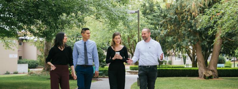 staff walking on campus