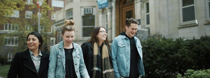 Four students walking in Ottawa at the Laurentian Leadership Centre (LLC).