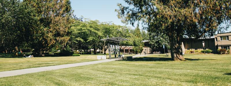 Langley campus in summer, bright, sunny, green.