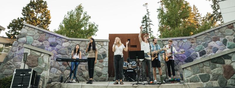 Students leading worship at the TWU outdoor chapel.