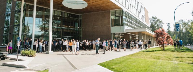 staff and faculty outside kuhn centre