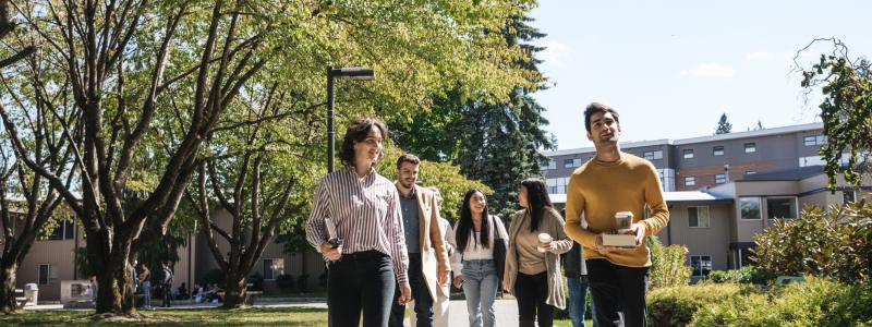 students walking in front of douglas centre