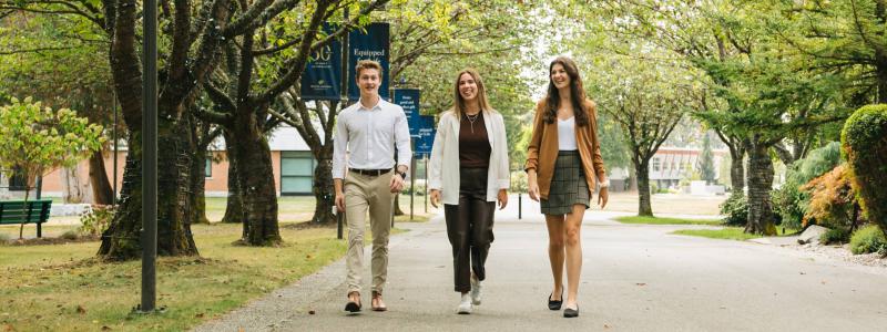 trinity fellows walking outside 2022
