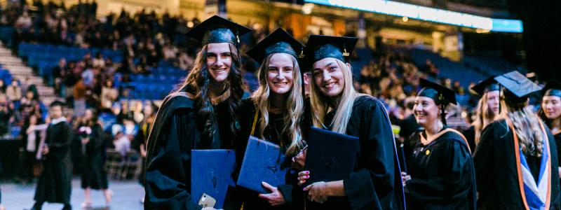 group of graduates smiling
