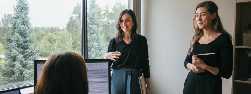 women meeting in room with window