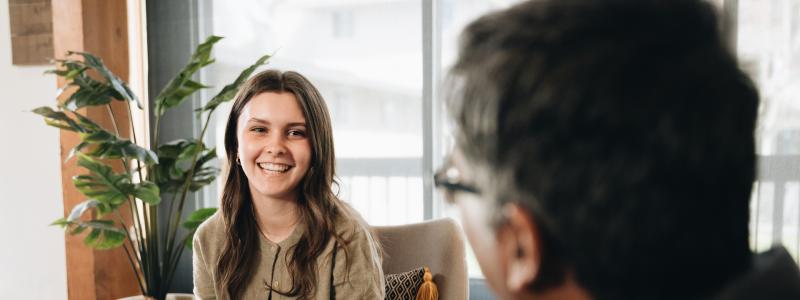 student talking to professor